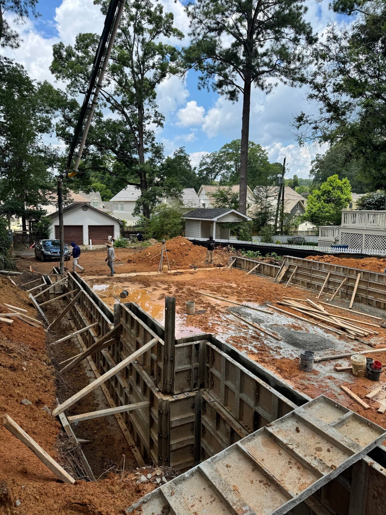 Foundation formwork being set for a new construction project